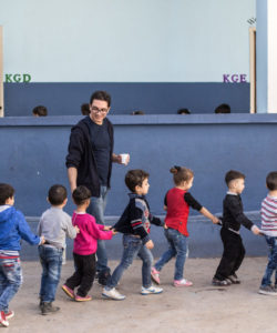 Children walk in line at the JRS FVDL centre in Bourj Hammoud, Lebanon.