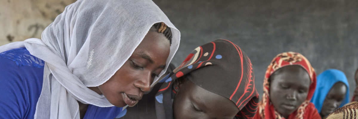 Refugee woman teaches class in South Sudan