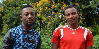 Alain and Toussaint work to support youth in their community.