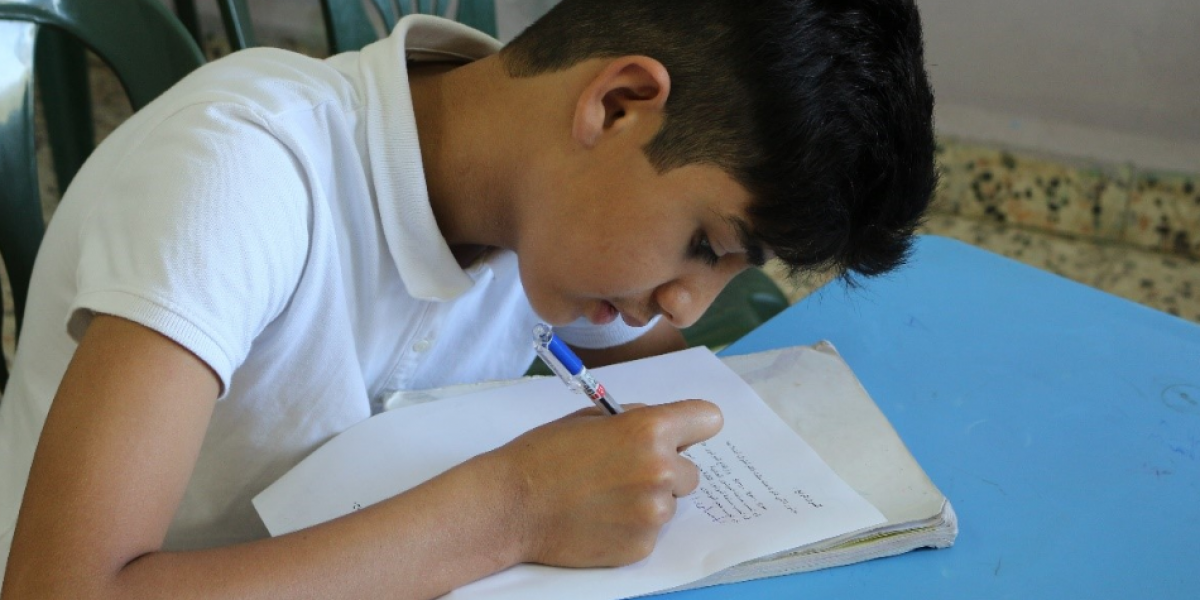 Syrian child studying