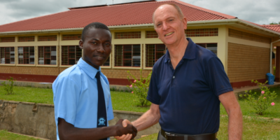Vumilia with Fr Thomas H. Smolich, JRS International Director