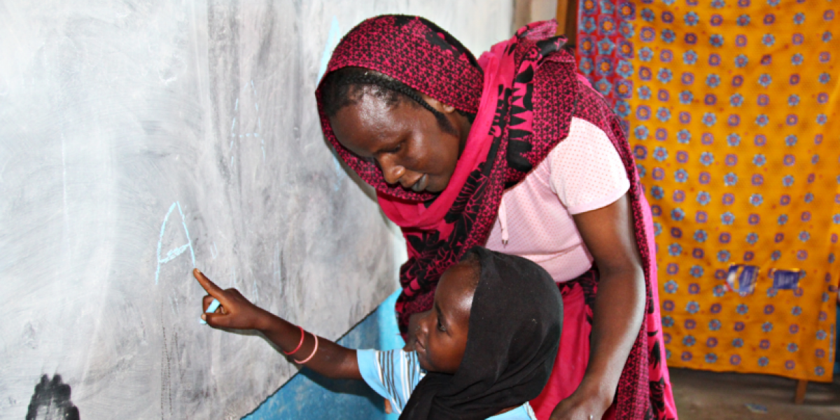 A teacher and her student at one of the JRS-run schools in Goz Beïda, Chad.