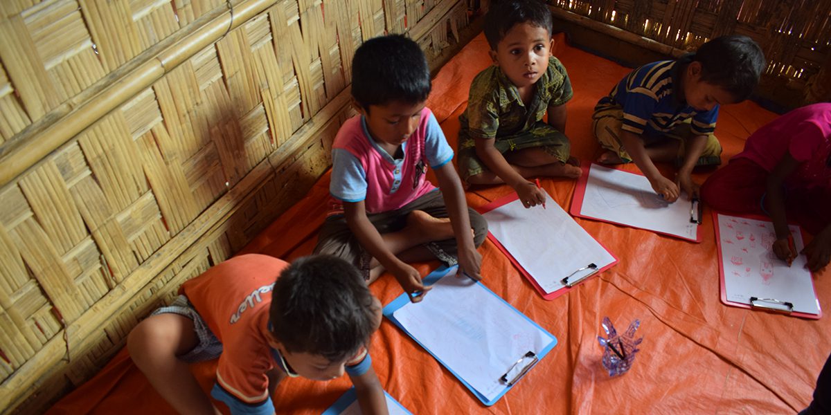 Rohingya children attending the activities of the JRS Child Friendly Spaces