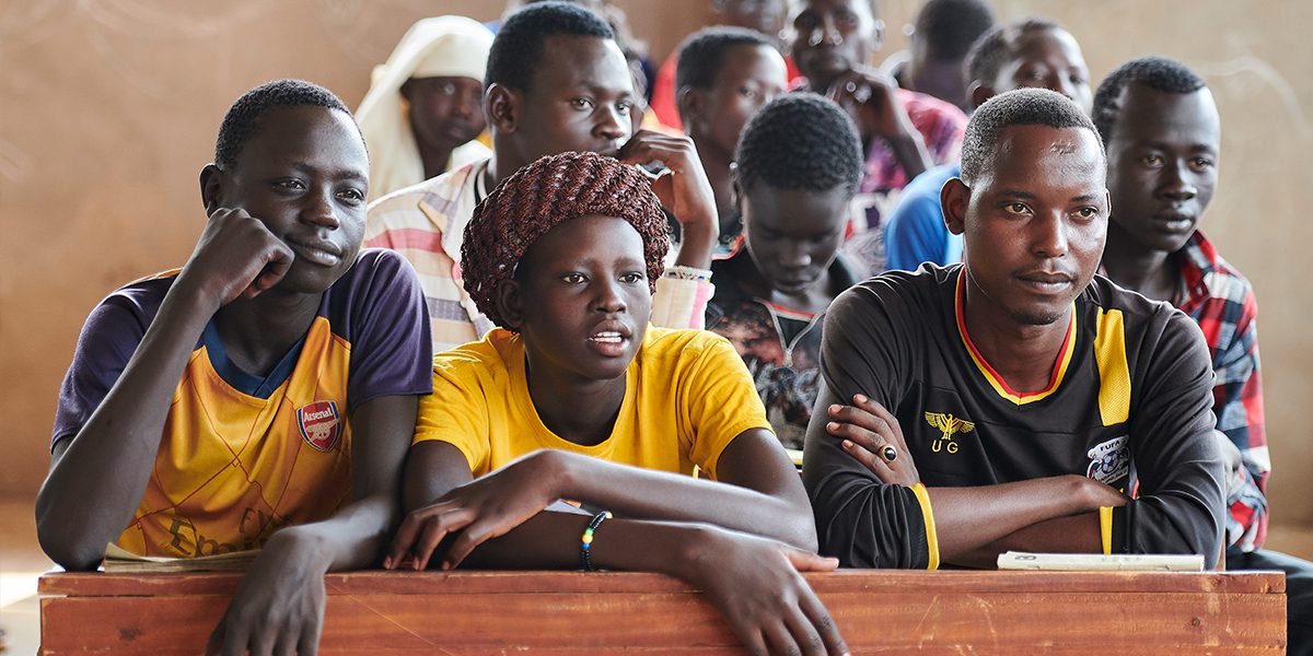 JRS South Sudan: Students in an English class in the Arrupe Learning Center, run by JRS in Bunj, South Sudan. Participants come from four refugee camps in Maban County that together shelter more than 130,000 refugees from the Blue Nile region of Sudan, along with local residents from the host community.