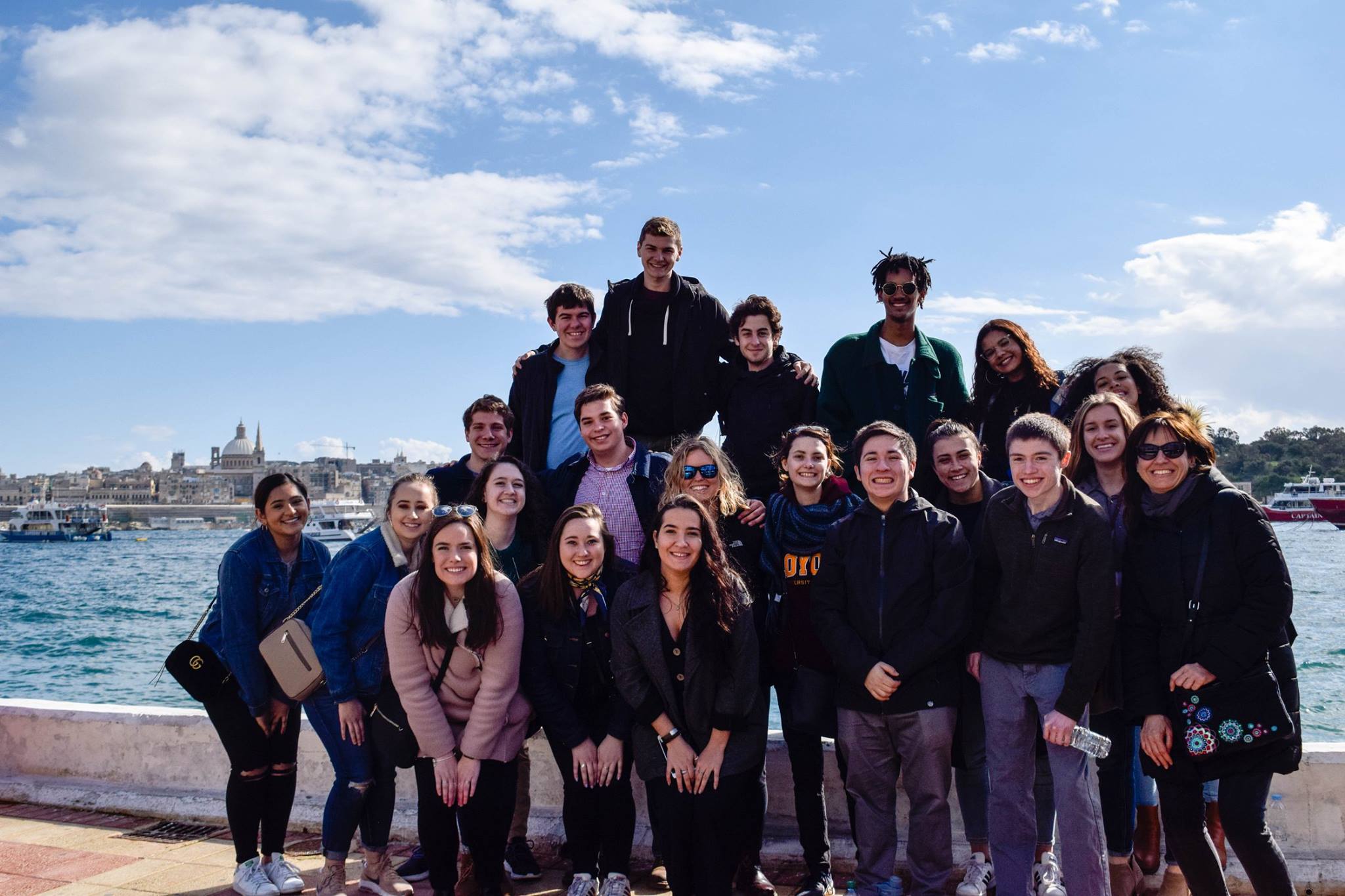 A group of students from Loyola University Chicago's John Felice Rome Centre poses for a photo in Malta where they learned about the refugee situation in the country (Ola Wysocki)