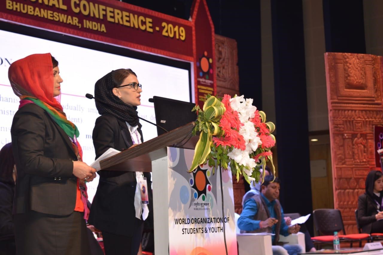 Bashria Jan Sarwari gives a speech at a student ceremony. (Jesuit Refugee Service)
