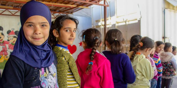 Young female students line up at a JRS school in Baalbek, Lebanon.