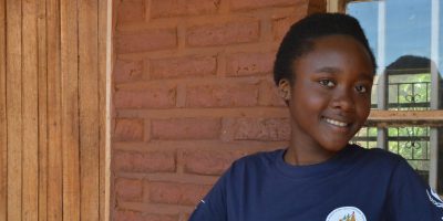 Christella est une jeune fille qui vit dans le camp de réfugiés de Dzaleka et est passionnée par l'éducation des réfugiés.