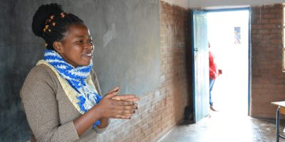 Claudine volunteers as a community social worker for the Naweza project in Dzaleka refugee camp.