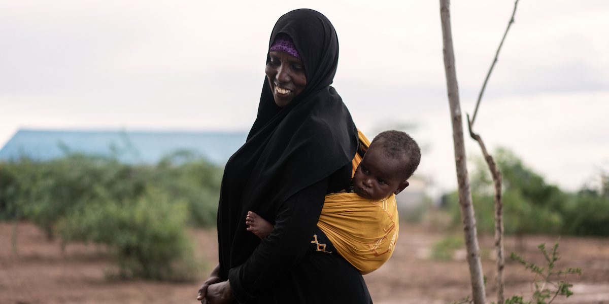 Rahma came to Kakuma as a refugee from Ethiopia together with her husband and oldest son in 2018, While her 8 other children remained behind. She took a training and now work as a JRS staff for the Special Need unit in centre 4. She also adopted baby Blaze, who was left alone by her parents. (Fredrik Lerneryd/Jesuit Refugee Service)