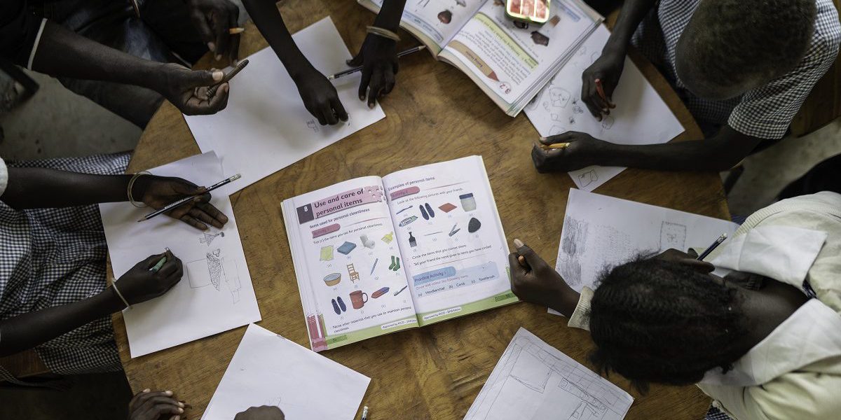 GEI Goals: 23 Children drawing during an art therapy class at the JRS Special Needs Centre in Kakuma refugee camp, Kenya.