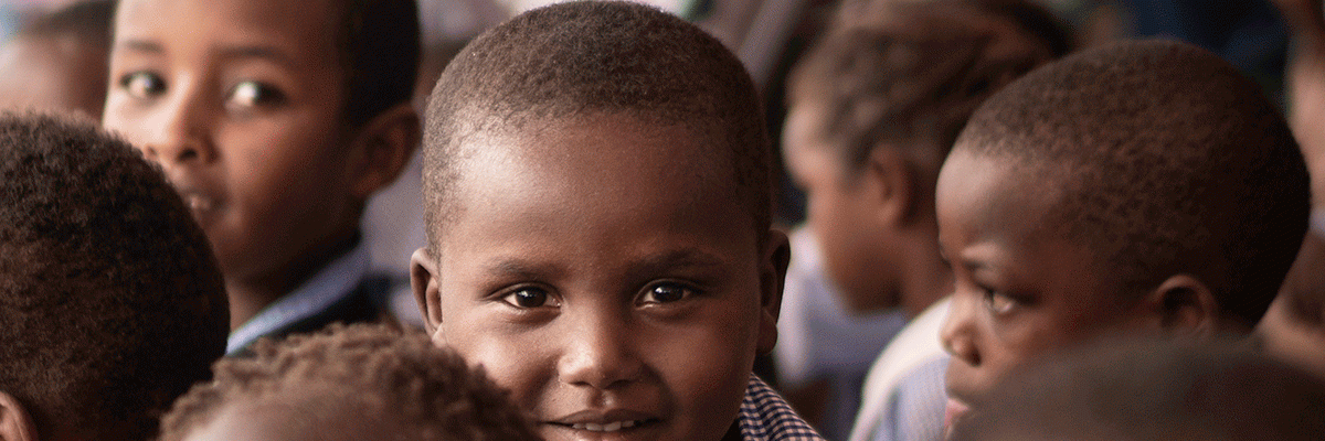 Cover of JRS's 2019 annual report: special needs students participate in an event in Kakuma refugee camp, Kenya.