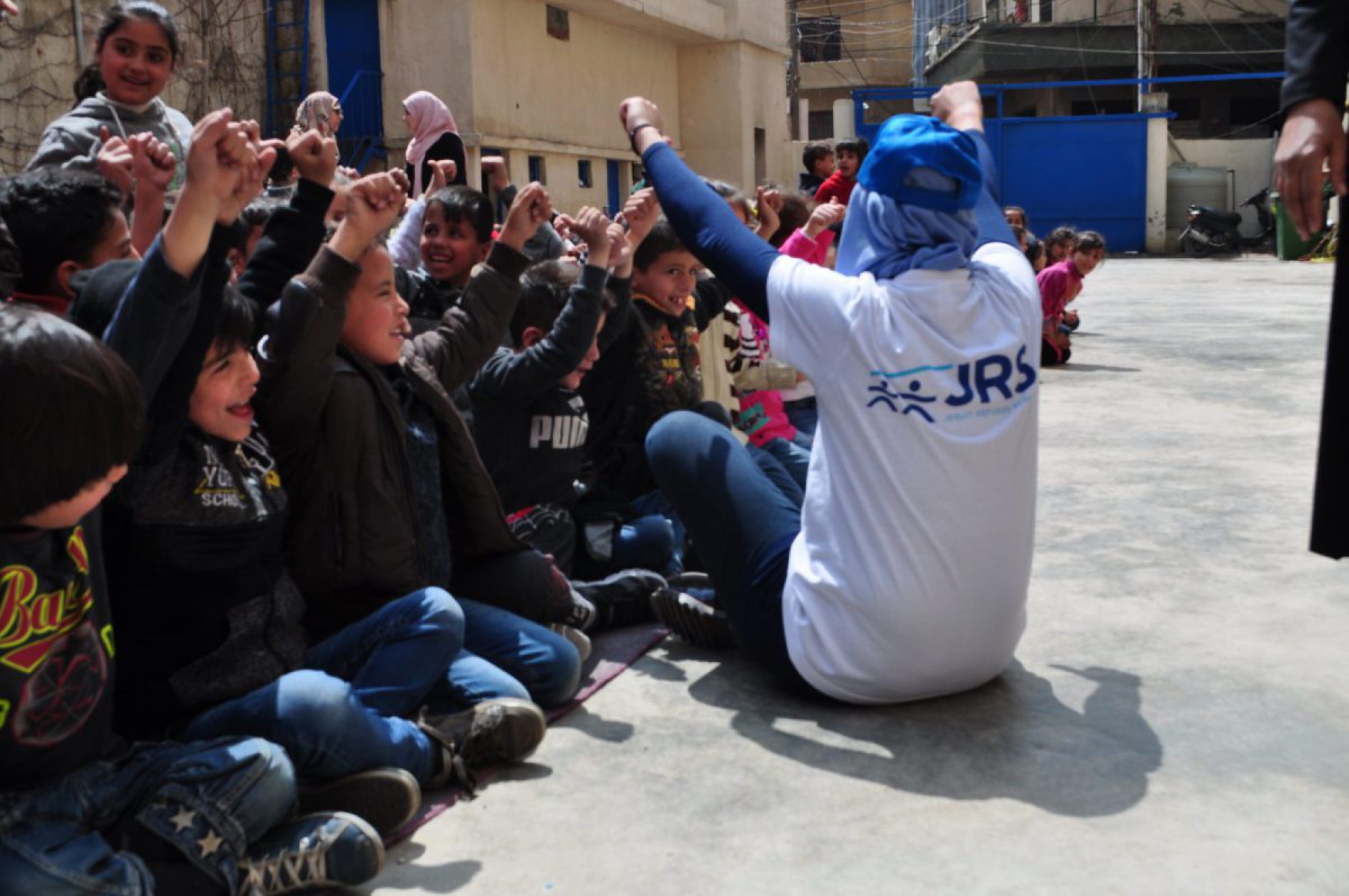 A JRS teachers entertain students