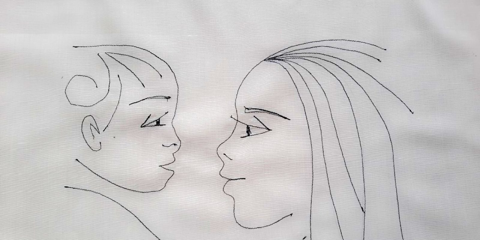 An drawing of a refugee mother and her child by the embroidery tutor, Manar Youssef, at Bar Elias centre to celebrate Mother's Day.