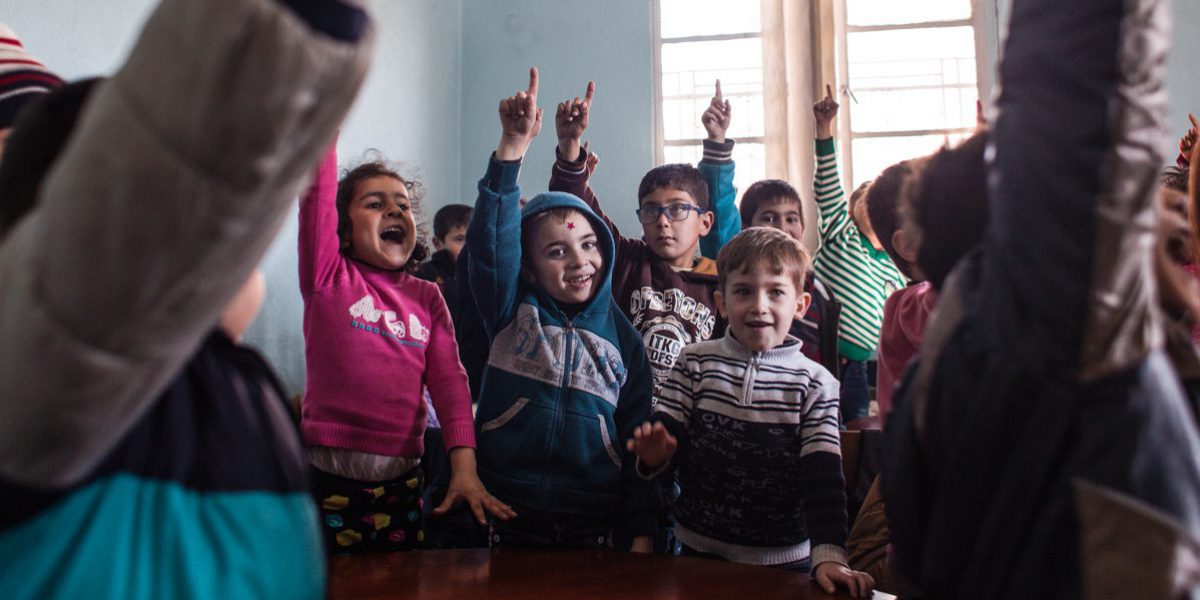 Des enfants syriens participent à des activités éducatives à Balbaak, au Liban (Kristóf Hölvényi/JRS).