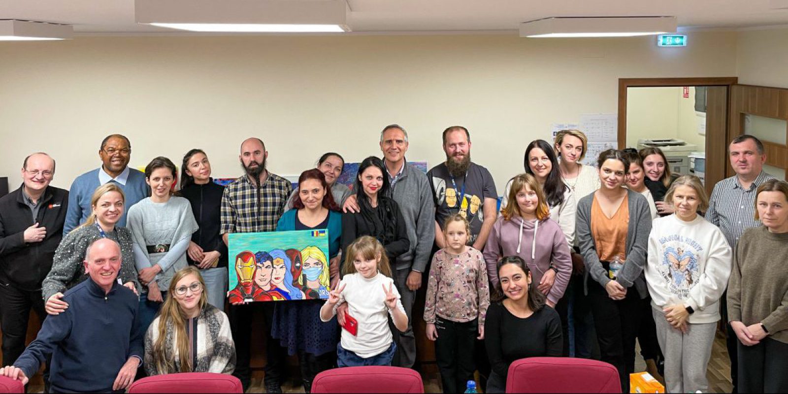 Year-end reflection JRS: Ukrainian and Romanian staff, together with JRS International Office and JRS Europe visiting staff share a moment together with refugees in Bucharest