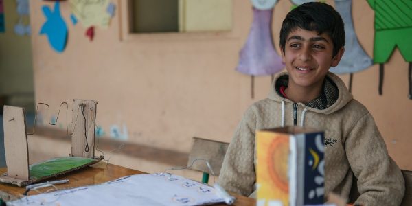 Oussama, with his inventions in the JRS Telyani school (Jesuit Refugee Service). A young Syrian refugee in Bar Elias, Lebanon, devises new inventions to improve the lives of his community.