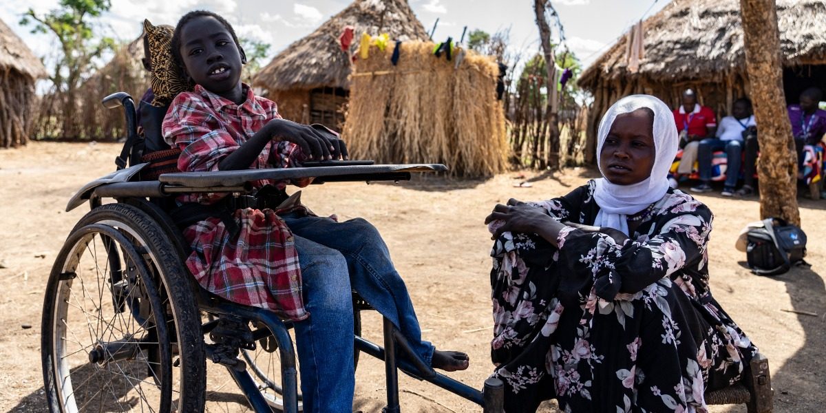 Azake, 12, on the left in Maban refugee camp, South Sudan (Jesuit Refugee Service). JRS teams provide rehabilitation and physiotherapy sessions to refugee children with disabilities in South Sudan.