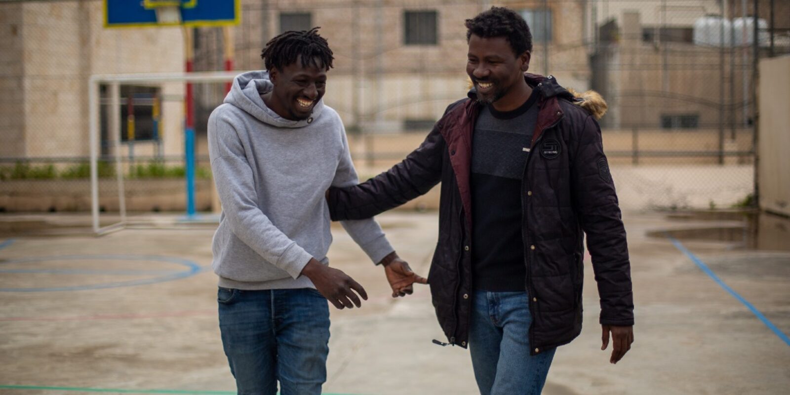 Yassin is a Sudanese rapper who has found refuge in Jordan and uses his music to amplify the voices of those who are not heard. Yassin, Sudanese rapper, on the right, with his friend Mohdi, on the left (Jesuit Refugee Service)