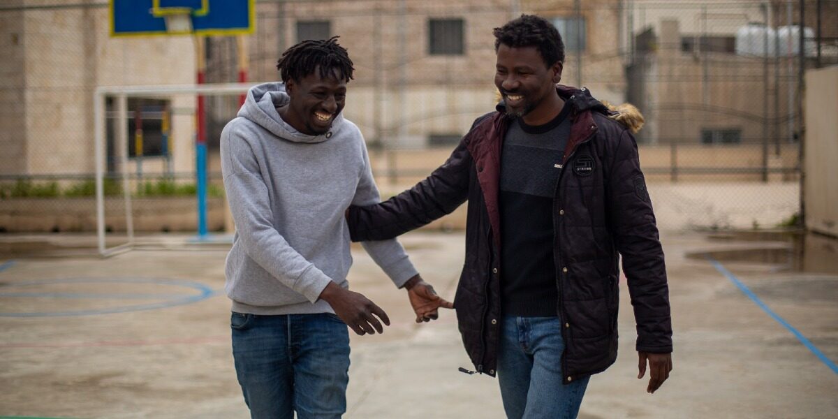 Beyond Labels is an invitation to see refugees and migrants as brothers and sisters who belong to our human family. Yassin, Sudanese rapper, on the right, with his friend Mohdi, on the left (Jesuit Refugee Service)