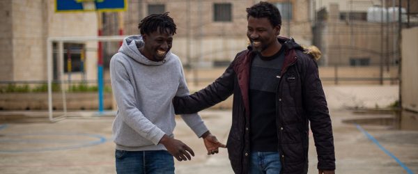 Beyond Labels is an invitation to see refugees and migrants as brothers and sisters who belong to our human family. Yassin, Sudanese rapper, on the right, with his friend Mohdi, on the left (Jesuit Refugee Service)