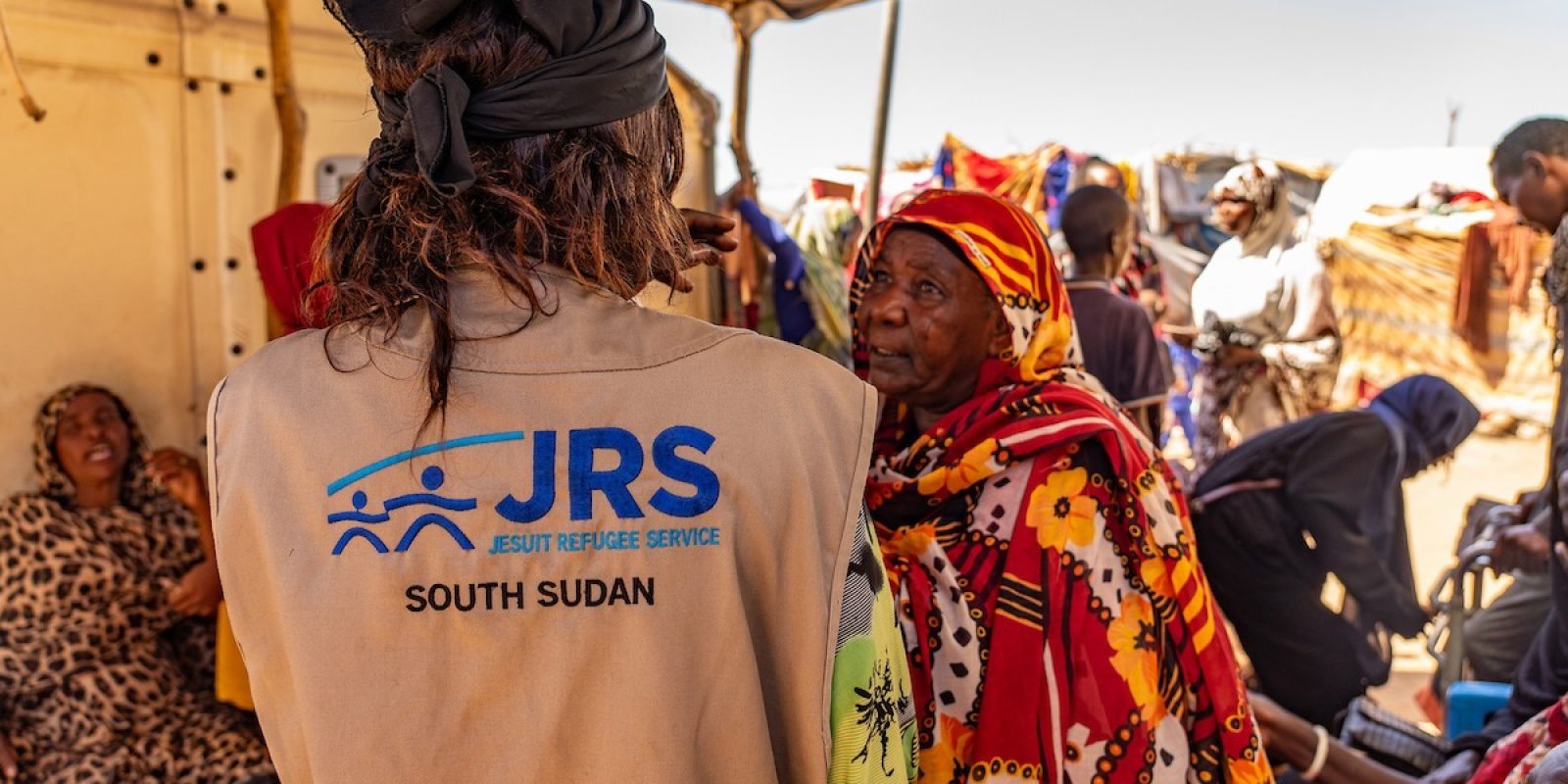 JRS providing assistance, including MHPSS services, to people fleeing the conflict in Sudan (Jesuit Refugee Service).